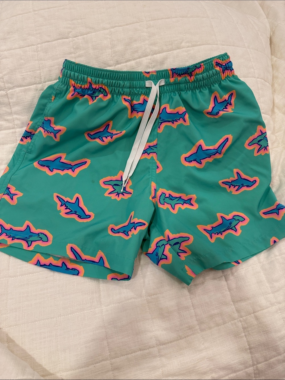 chubbies Teal Swim Trunks with Blue and Pink Shark Pattern